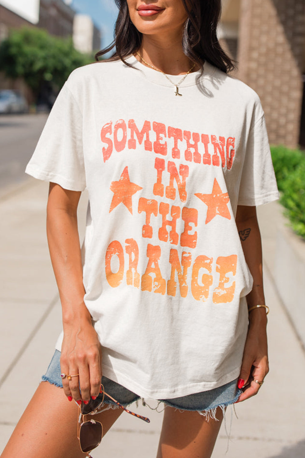 White SOMETHING IN THE ORANGE Graphic Crew Neck T Shirt Graphic Tees JT's Designer Fashion