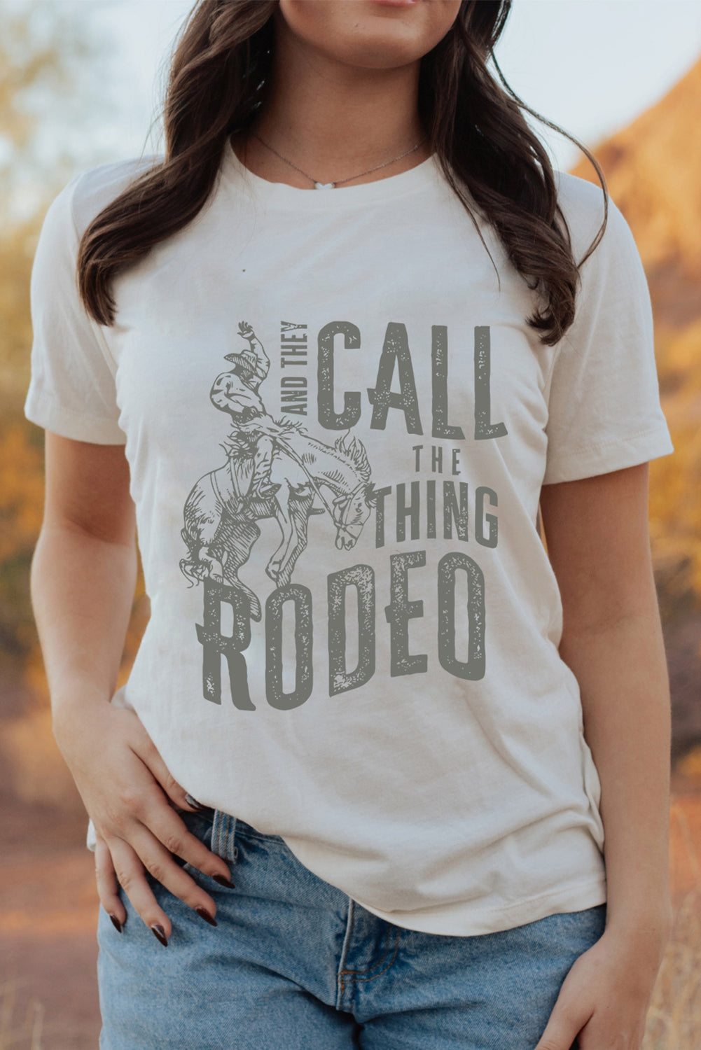 White AND THEY CALL THE THING RODEO Print Round Neck T Shirt Graphic Tees JT's Designer Fashion