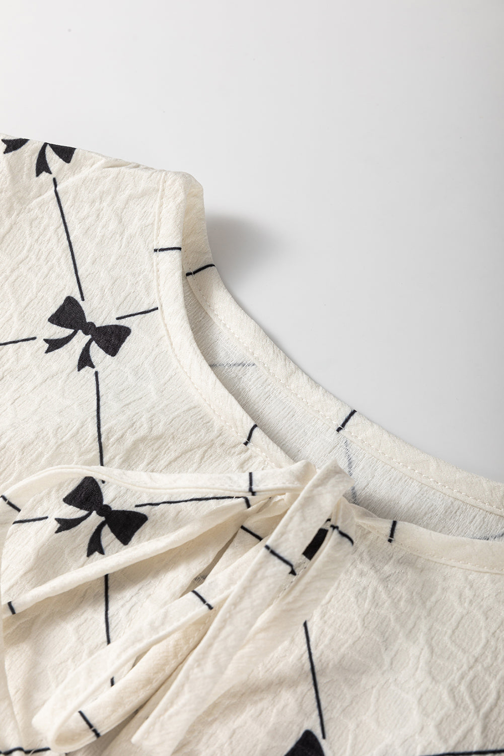 White Bowtie Pattern Textured Puff Half Sleeve Loose Mini Dress Mini Dresses JT's Designer Fashion
