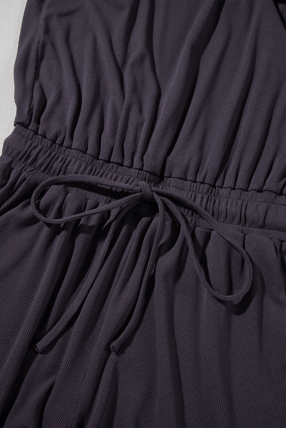Bristol Black Knit Open Back Cap Sleeve Drawstring Romper Jumpsuits & Rompers JT's Designer Fashion