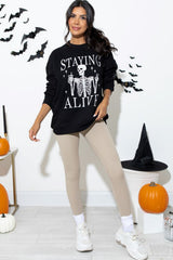 Black STAYING ALIVE Skull Graphic Crewneck Halloween Sweatshirt Graphic Sweatshirts JT's Designer Fashion