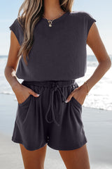 Bristol Black Knit Open Back Cap Sleeve Drawstring Romper Jumpsuits & Rompers JT's Designer Fashion