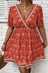 Orange Plus Size Printed Surplice Neck Empire Waist Flowy Mini Dress Plus Size Mini Dresses JT's Designer Fashion